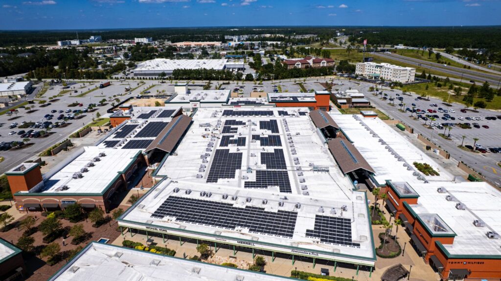 Aerial view of rooftop solar at a retail outlet center in Savannah, GA
